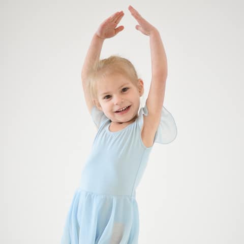 Young Dancer in Blue Smiling